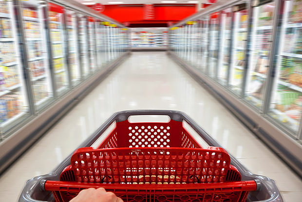 Shopping cart in frozen food section